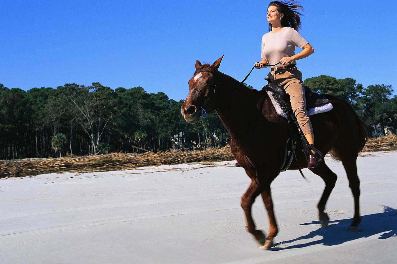 Woman Riding Galloping Horse.